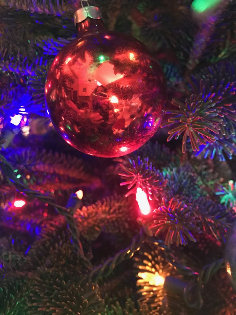 Christmas lights and red ornament