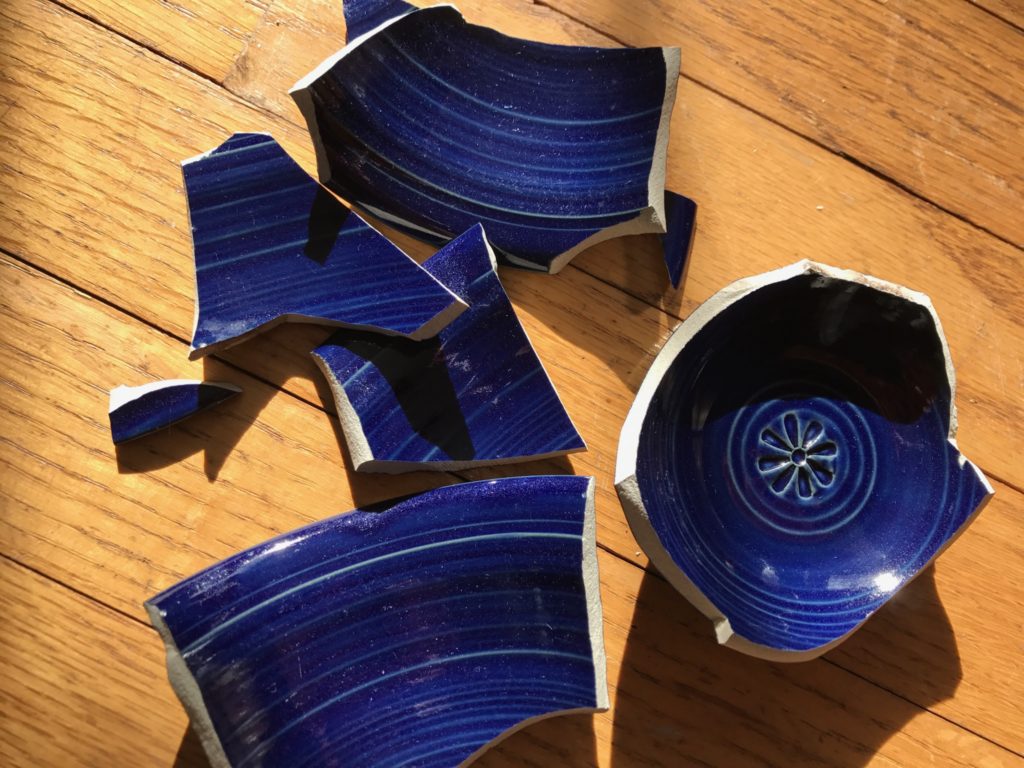 broken blue bowl