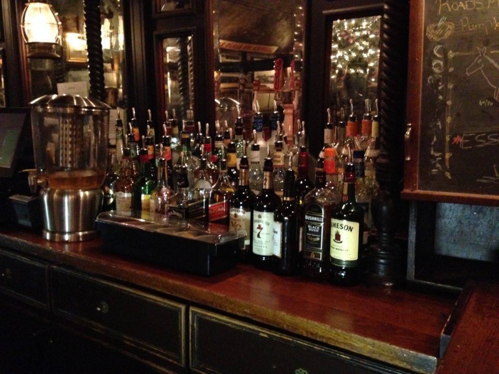 bar with bottles of alcohol