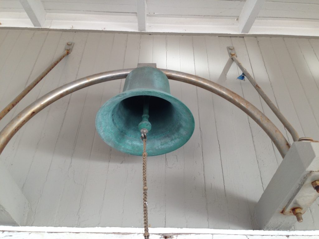 copper bell with green patina