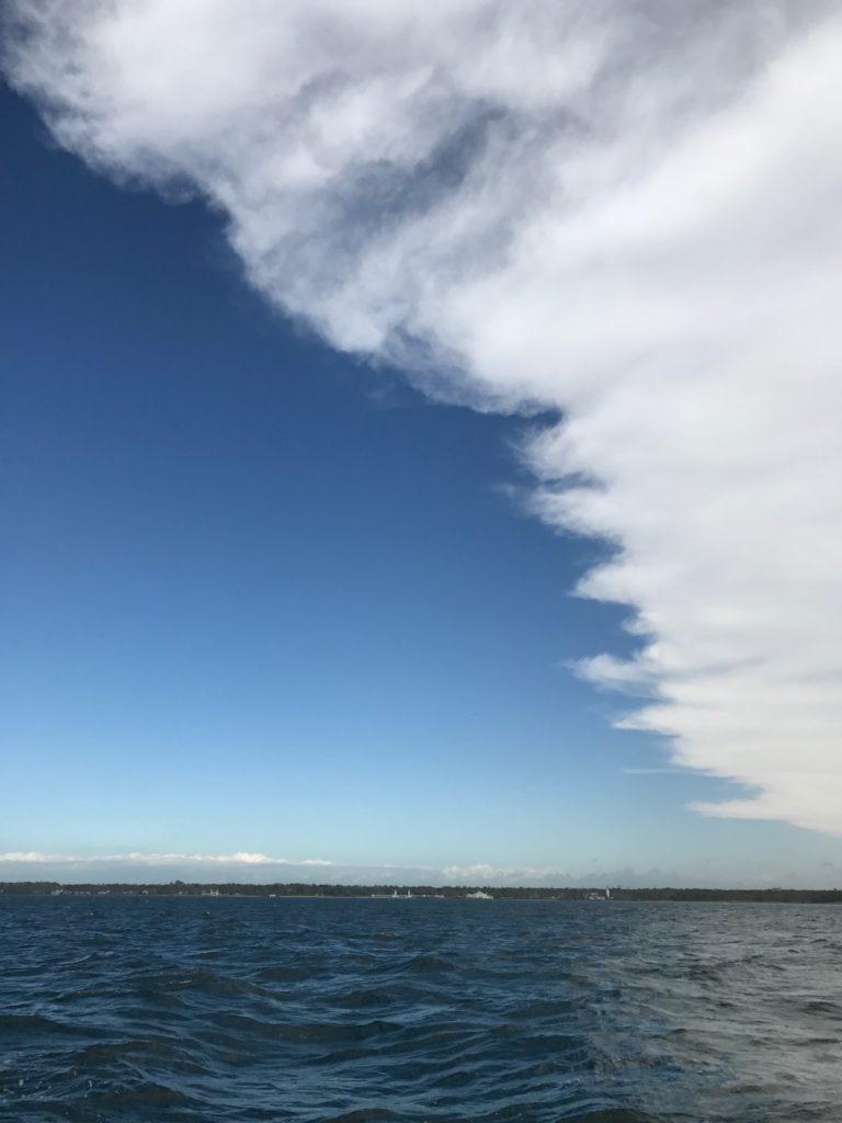 clouds giving way to clear sky