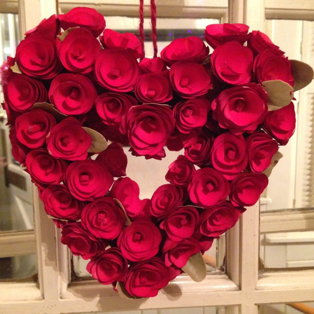 heart-shaped wreath of red flowers